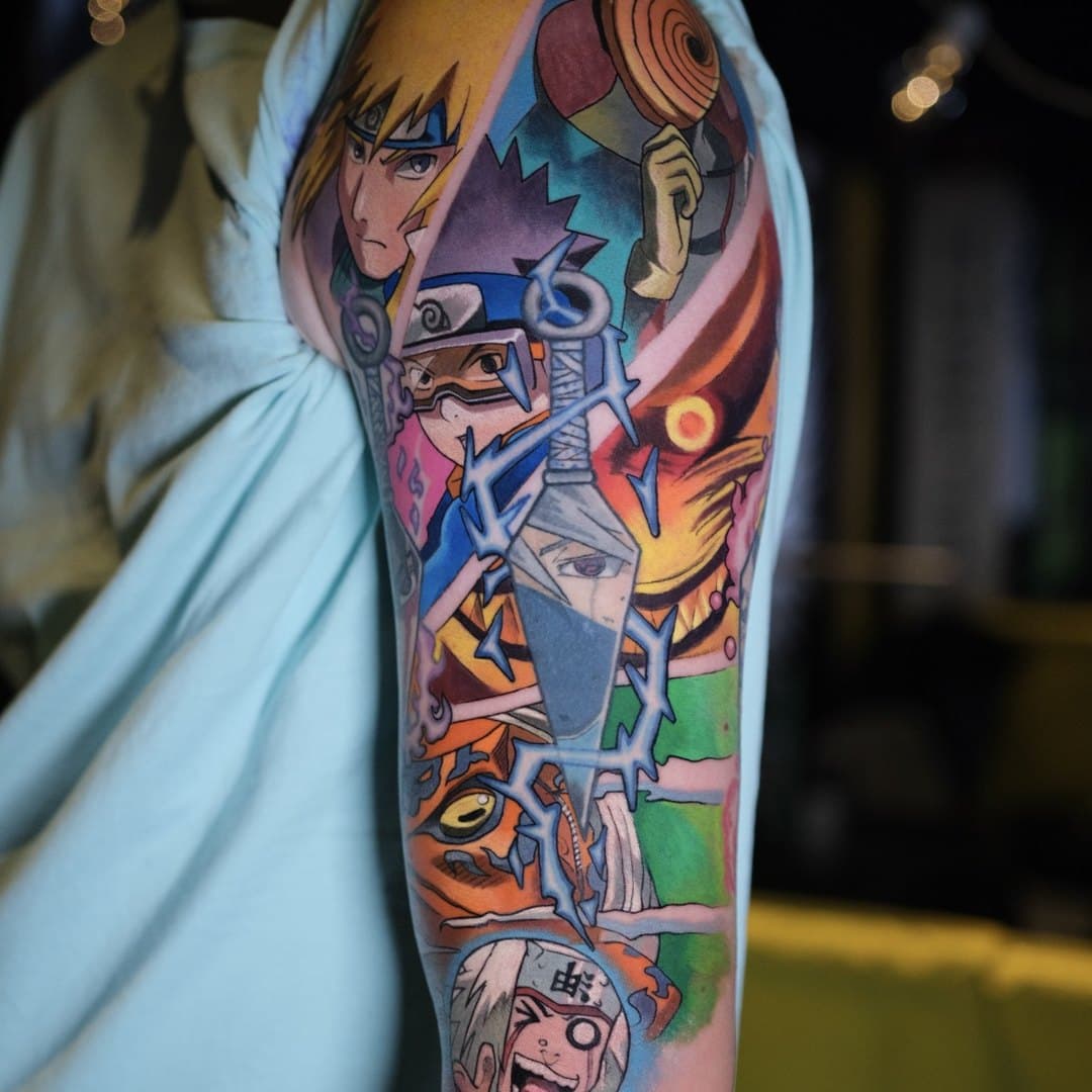Färgsleeve på arm med populärkulturella motiv av Tymur Denysenko, Zoi Tattoo House Malmö